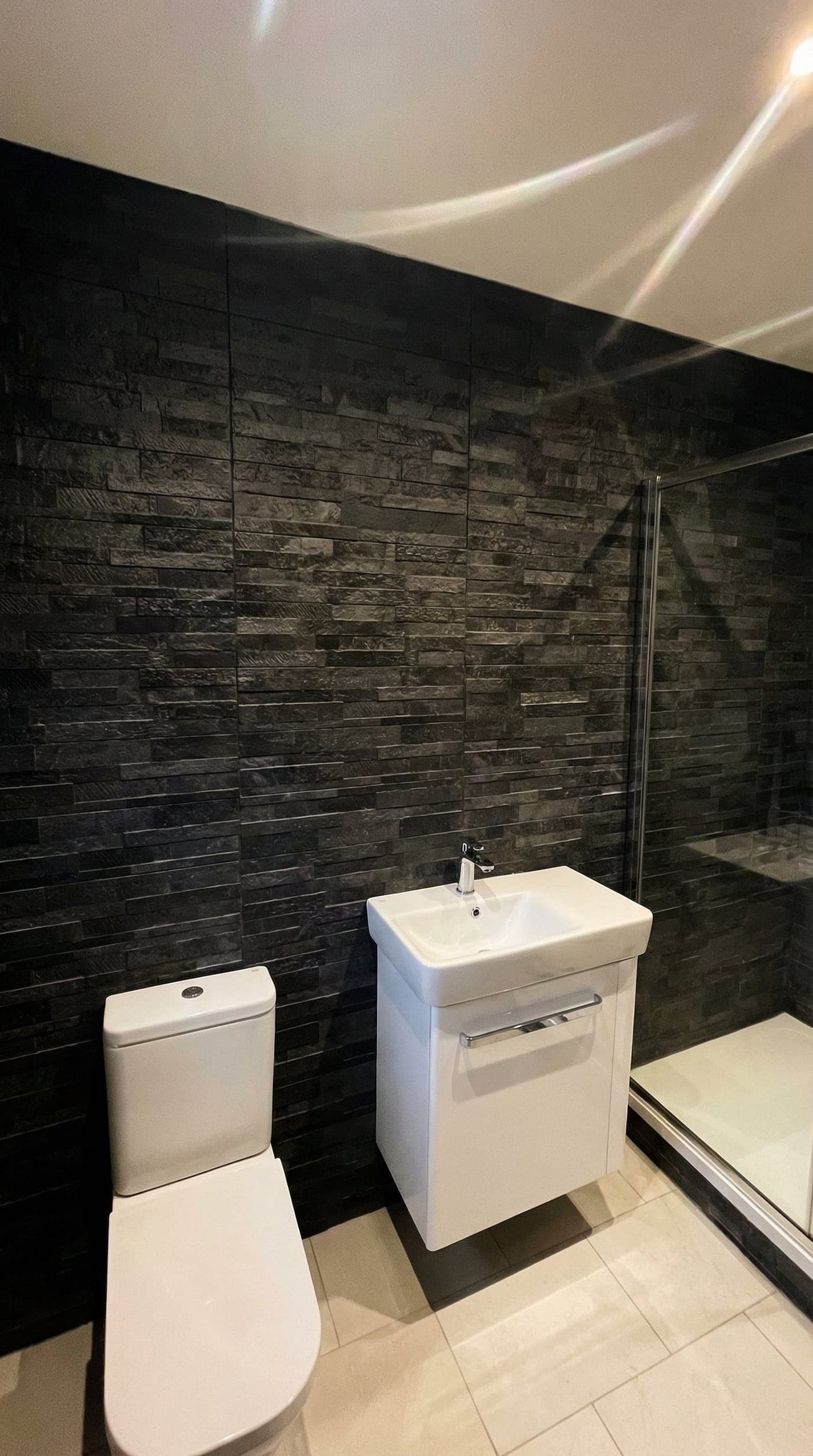 Dark stone bathroom